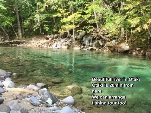 a picture of a river with the words beautiful river in qatar qatar is at TOYA HOME kairou 一棟貸切 in Lake Toya