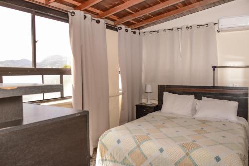 Postel nebo postele na pokoji v ubytování Calle 8 Suites