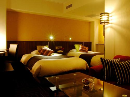Postel nebo postele na pokoji v ubytování Central Hotel