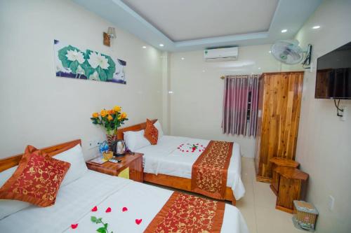 Cat Ba Bay Vision Hotelにあるベッド