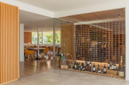 a wine cellar with a wall of wine bottles at Flamingo Beach Mate in Adeje