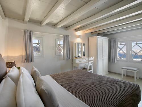 Ένα ή περισσότερα κρεβάτια σε δωμάτιο στο Leonis Summer Houses