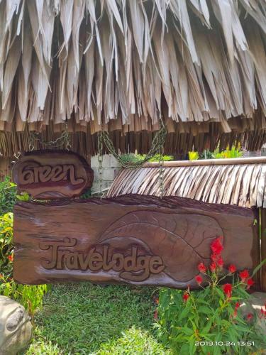 a sign that says open havelockable sitting in front of a building at Green Travelodge Bukit Lawang in Bukit Lawang