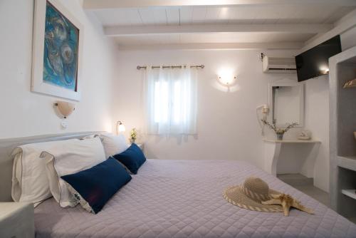 Ένα ή περισσότερα κρεβάτια σε δωμάτιο στο KrotiriBay adults