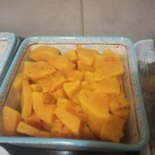 a container filled with mangoes at faces guesthouse in Bethlehem