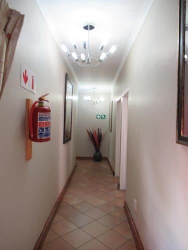 a hallway of a room with a ceiling at faces guesthouse in Bethlehem