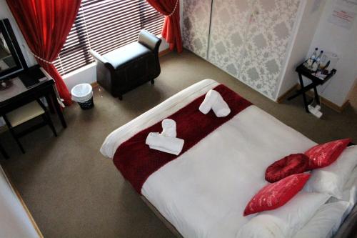 Katil atau katil-katil dalam bilik di Belle Vue Guesthouse