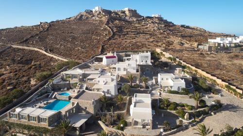 an aerial view of a house on a mountain at Kallos of Mykonos - previous Leonis Summer Houses in Ornos