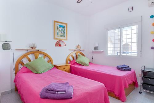 A bed or beds in a room at 053 La Mata Dunes - Alicante Real Estate