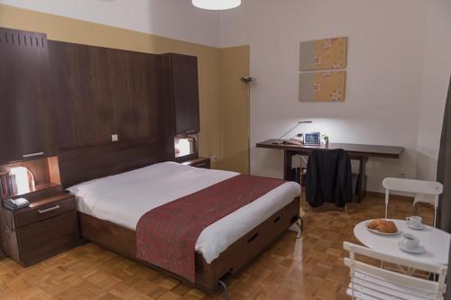 Ein Bett oder Betten in einem Zimmer der Unterkunft Key Inn Appart Hotel Belair