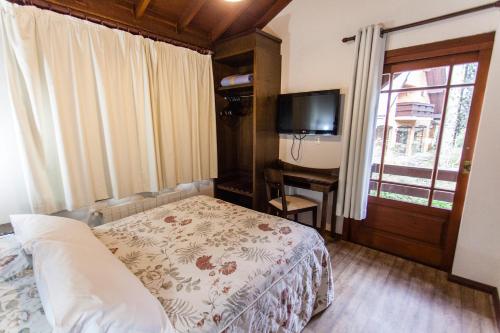 Katil atau katil-katil dalam bilik di Tri Hotel Lago Gramado
