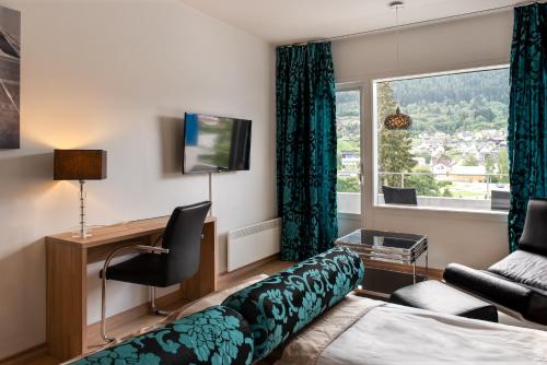Quality Hotel Sogndal tesisinde bir televizyon ve/veya eğlence merkezi