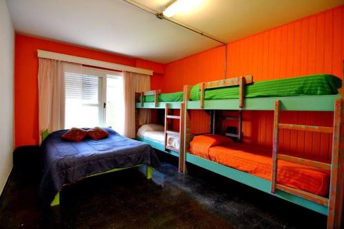 Postel nebo postele na pokoji v ubytování Hostel del Puerto