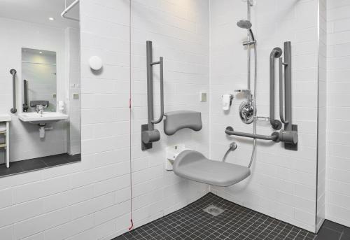 a bathroom with a toilet and a sink at Holiday Inn Express Dublin City Centre by IHG in Dublin