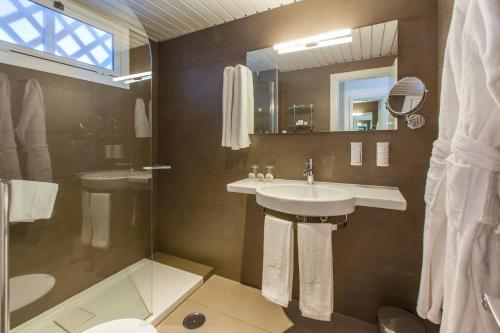 Kúpeľňa v ubytovaní Corallium Beach by Lopesan Hotels - Adults Only
