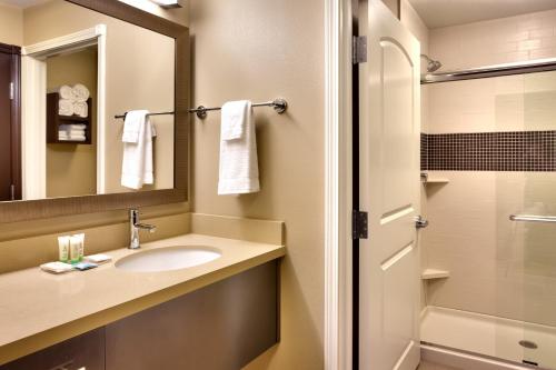 A bathroom at Staybridge Suites Cheyenne, an IHG Hotel