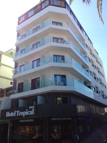 a hotel tropical is shown in front of a building at Hotel Tropical in Puerto de la Cruz