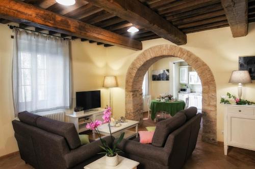 A television and/or entertainment centre at Castello di Gallano Resort