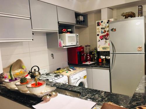 Una cocina o kitchenette en Departamento En Cerro de las Rosas De lujo