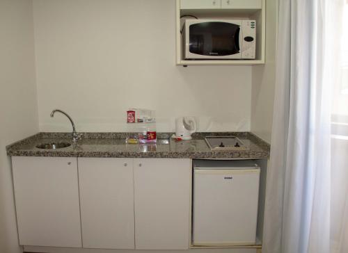 Kitchen o kitchenette sa Aparthotel Twin Towers