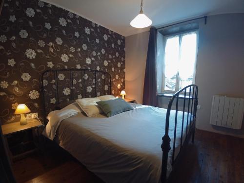 Cama o camas de una habitación en Le Moulin des Valignards - Chambres d'hôtes