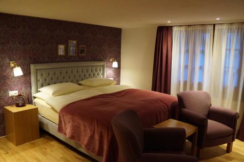 Postel nebo postele na pokoji v ubytování Hotel Walliserhof Zermatt