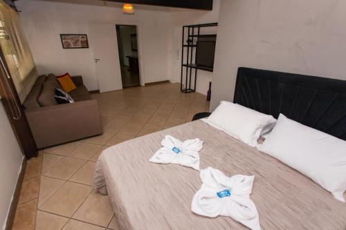 Katil atau katil-katil dalam bilik di Hotel Vila Germânica