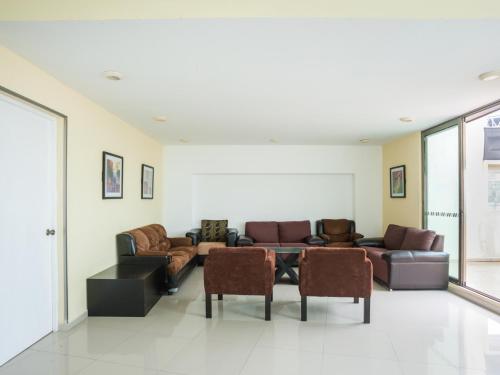 Un lugar para sentarse en Veracruz Suites Hotel