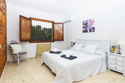 A bed or beds in a room at Jasmin