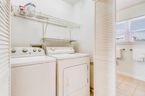 a laundry room with a washer and dryer at Reflections in Indian Pass