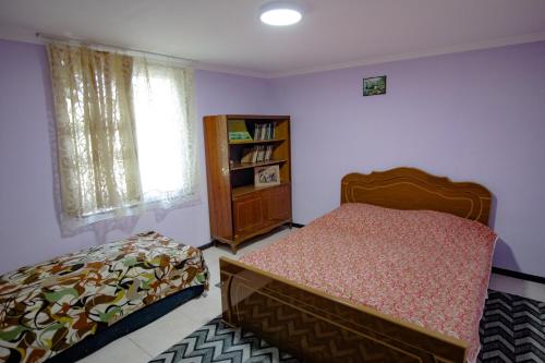 Postel nebo postele na pokoji v ubytování Holiday Home Ekaterine