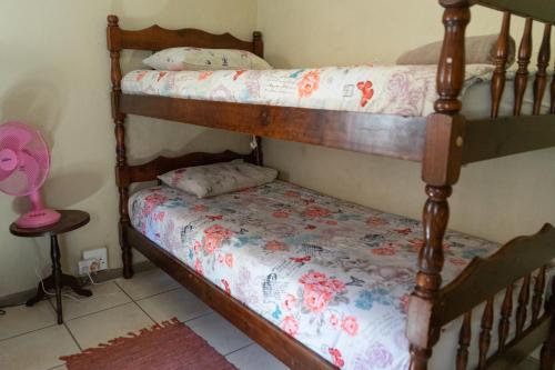 Ένα ή περισσότερα κρεβάτια σε δωμάτιο στο Bay Vista Guesthouse