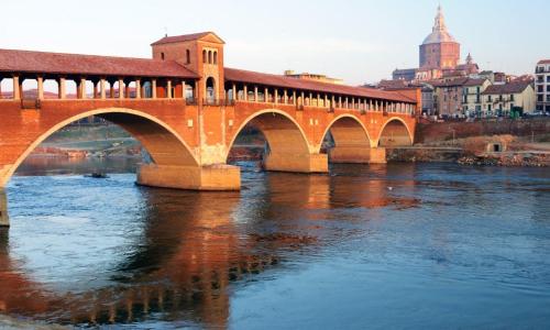 a bridge over a river in a city at B&B dalLo Zio in Ottobiano