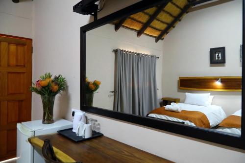 Ένα ή περισσότερα κρεβάτια σε δωμάτιο στο Cest Si Bon Hotel