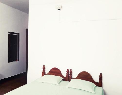 Cama o camas de una habitación en Hill Mist Thekkady