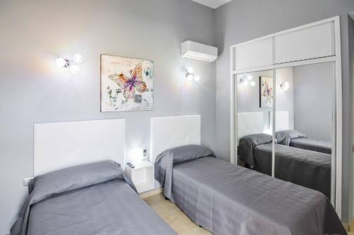 Postel nebo postele na pokoji v ubytování Villa Miranda