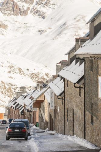 a row of buildings with snow covered roofs at Pierre & Vacances Pas de la Casa Princesa in Pas de la Casa