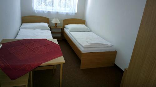 Postel nebo postele na pokoji v ubytování Penzion Lada