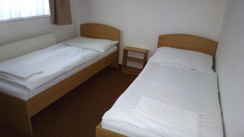 Cama o camas de una habitación en Penzion Lada
