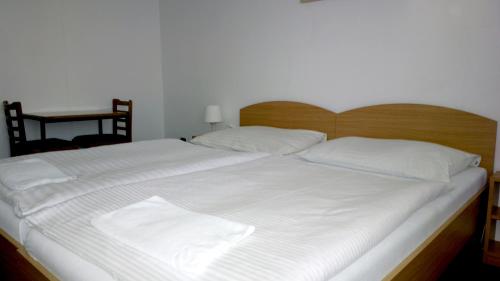 Cama o camas de una habitación en Penzion Lada
