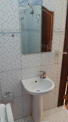 Koupelna v ubytování RoseVilla Hotel