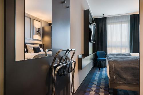 Voodi või voodid majutusasutuse Holiday Inn - the niu, Square Mannheim by IHG toas