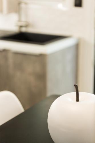 a knife sitting on top of a table at Ocean Dream Apartment! in Balíon