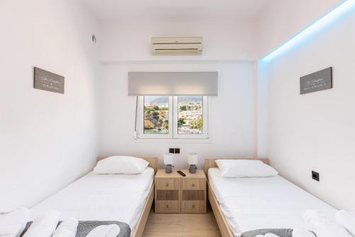 En eller flere senge i et værelse på Ocean Dream Apartment!