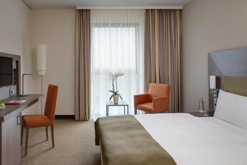 Postel nebo postele na pokoji v ubytování IntercityHotel Berlin Hauptbahnhof
