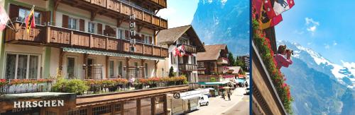 una strada in una città con edifici e fiori di Hotel Hirschen - Grindelwald a Grindelwald