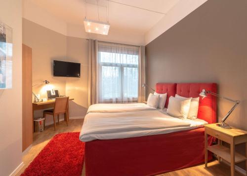 Voodi või voodid majutusasutuse Hotell Stadsparken toas