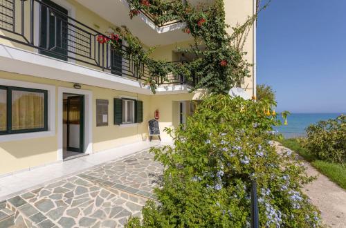 a house with a view of the ocean at Sea View Hotel in Alykes