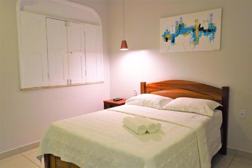 מיטה או מיטות בחדר ב-Pousada Spadart