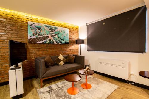 TV o dispositivi per l'intrattenimento presso Hostal Boutique Black Cat